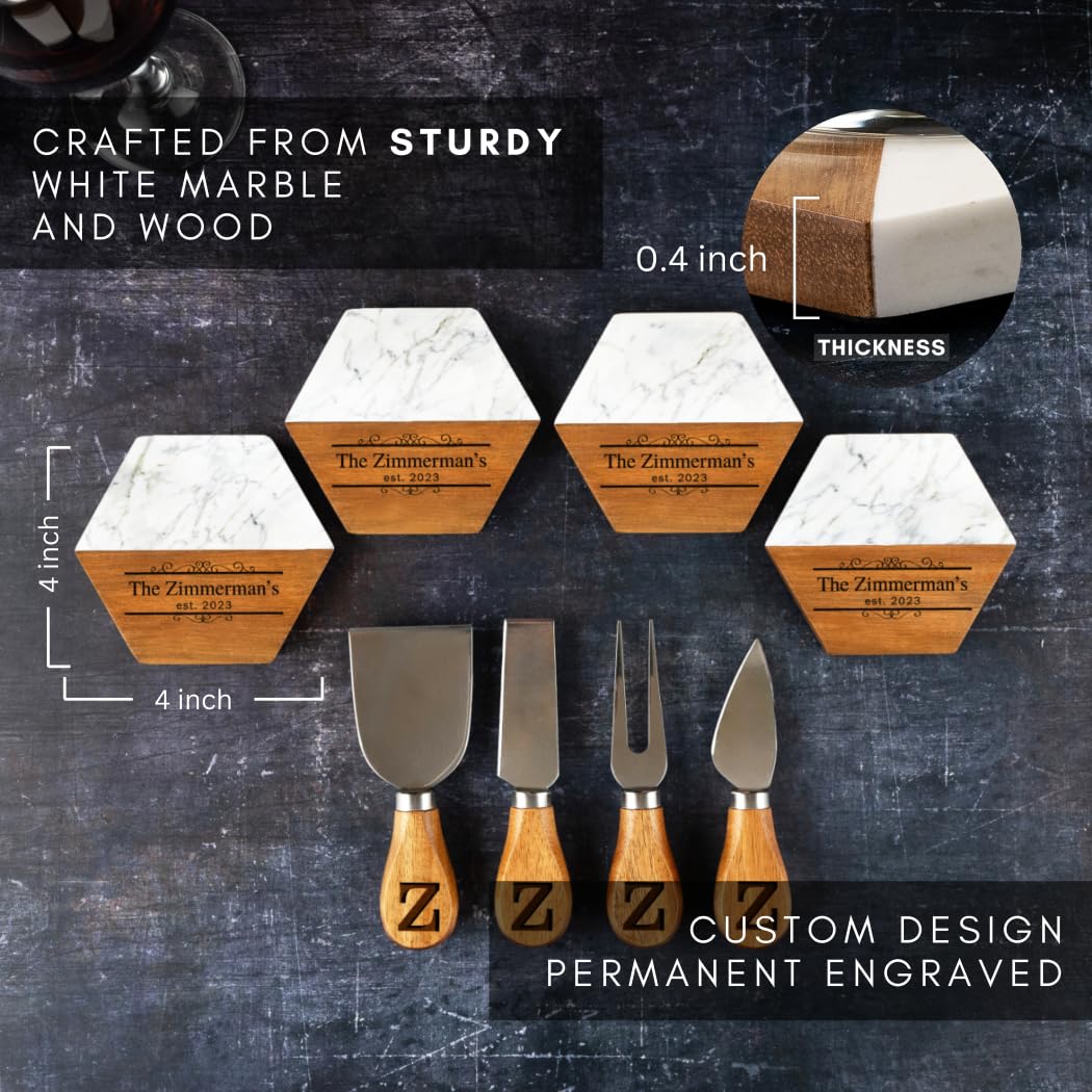 Set of cheese knives with marble and wood design on a dark background